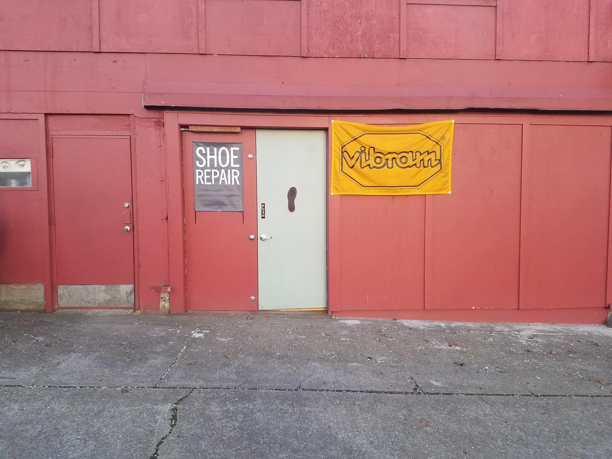 Shoe repair wall on sale street