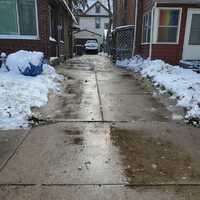 Lawn and property maintenance work in a neighborhood setting