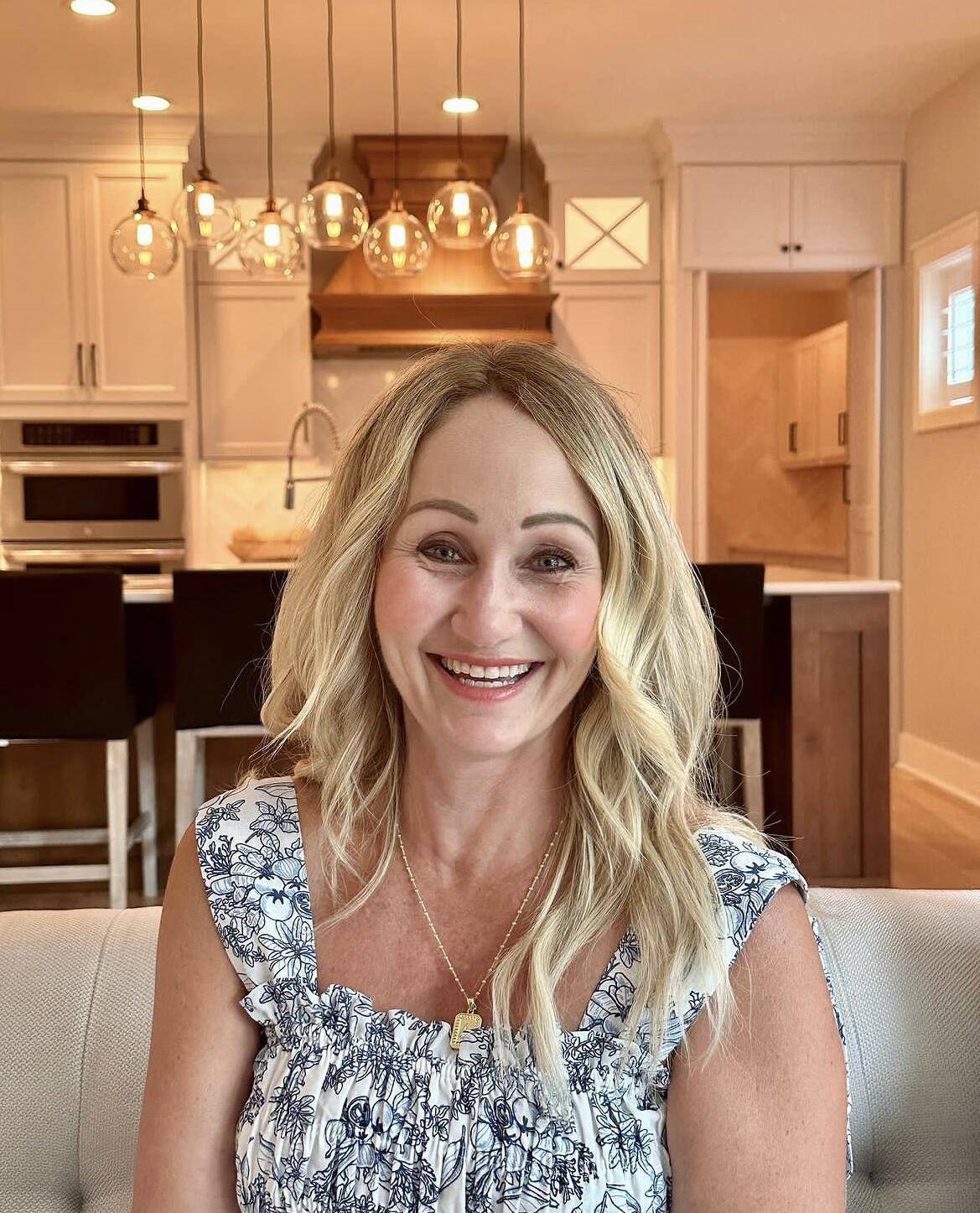 Andrea Oster, Realtor Berkshire Hathaway HomeServices Ambassador Real