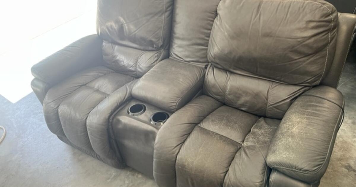 Lazy Boy recliner. large with center console and two cup holders for