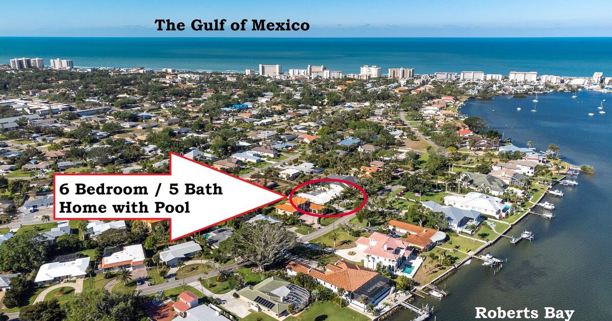 An Auction for this 6 Bedroom, 5 1/2 Bath Home with a Pool in Venice FL