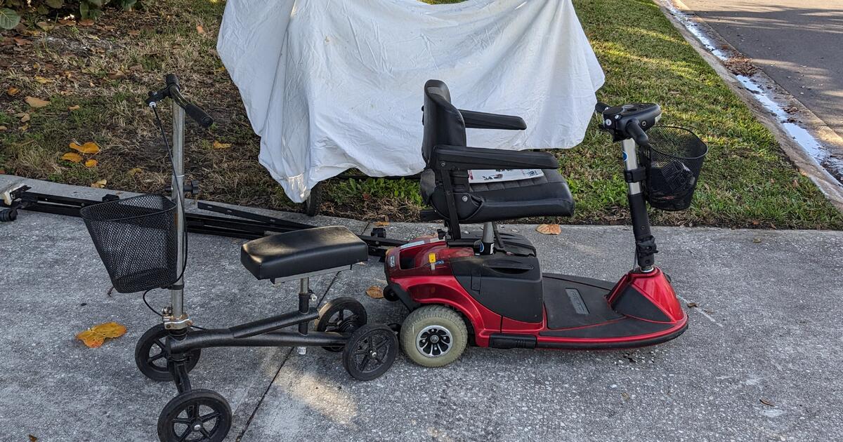 Yard sale mobility scooter and knee scooter for Free in St