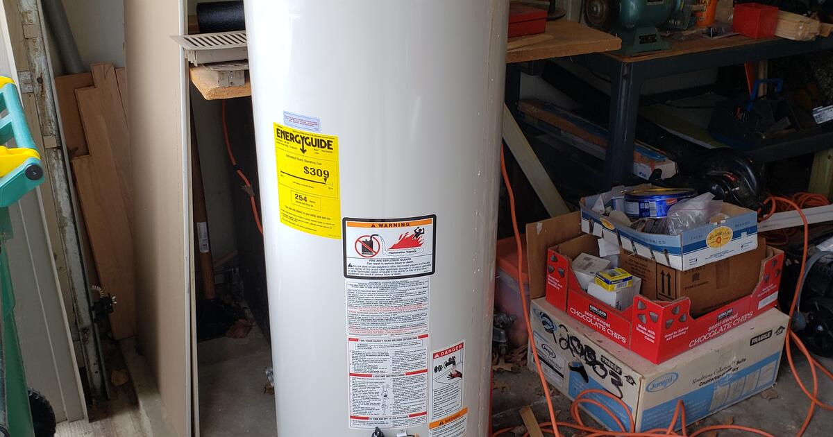 Working Hot Water heater for disposal help or to scrap iron for Free in