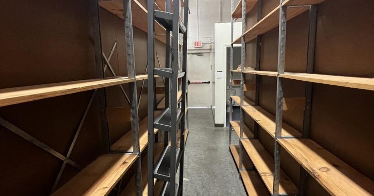 Stockroom/warehouse shelving and 2 metal ladders for Free in Jamestown