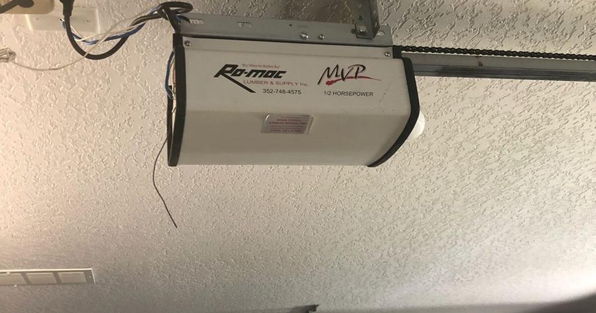 Two MVP garage door openers 1/2 hp, two wall openers, four remote