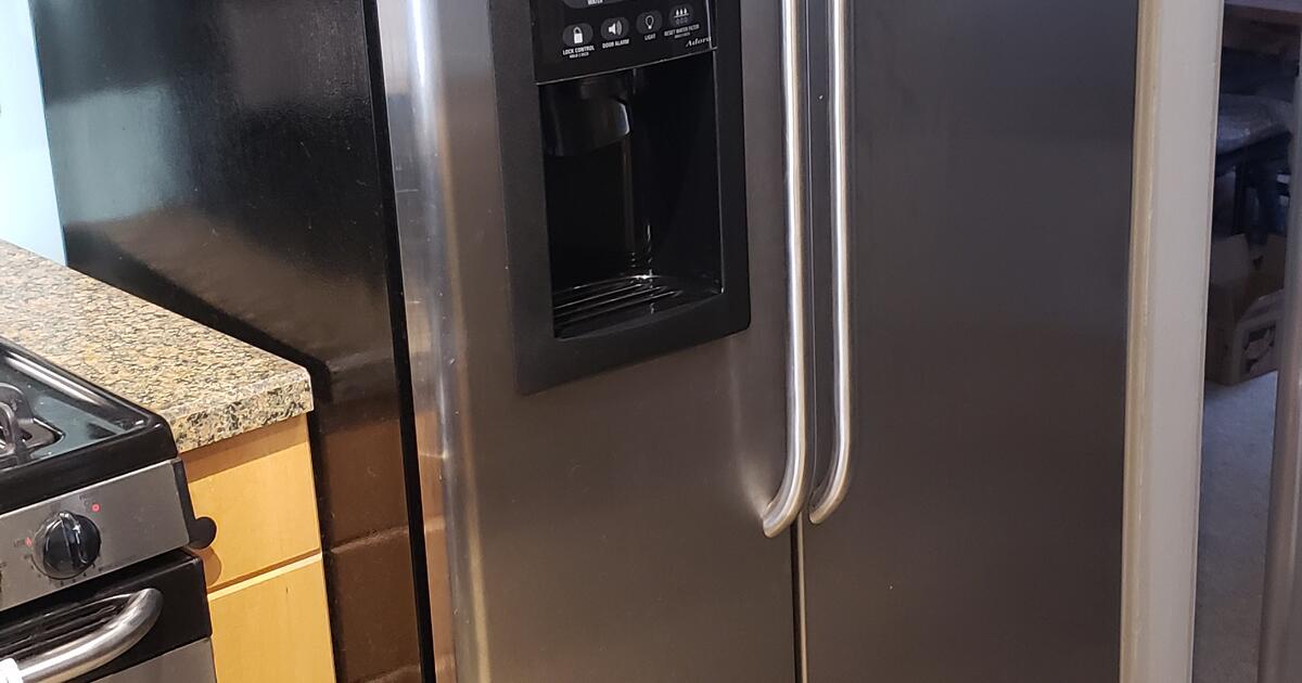 large GE Adora stainless and black refrigerator for Free in Holmes, PA