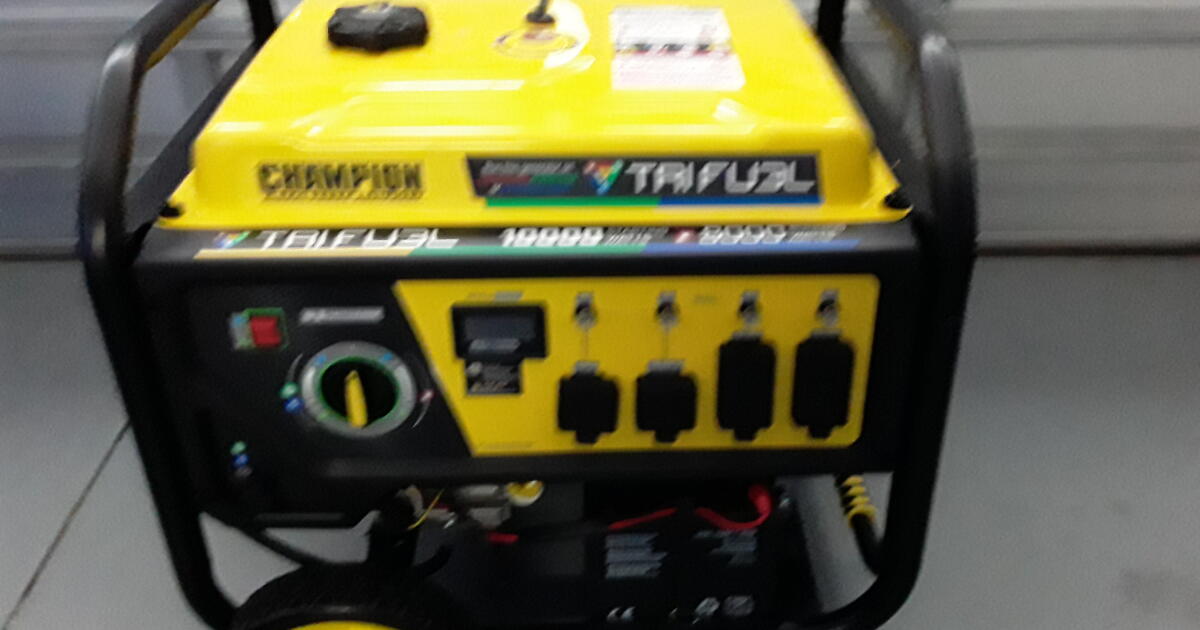 Champion Tri Fuel 8000 watt portable generator with heavy cords for