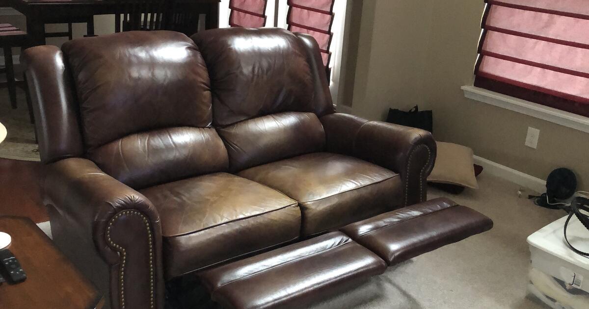 LaZ Boy Leather Loveseat with two reclining leg rests for 400 in