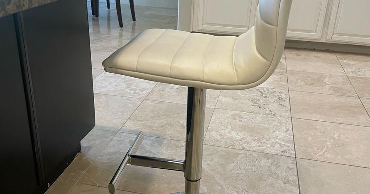 Four Ivory Leather swivel kitchen counter stools for 300 in Scottsdale