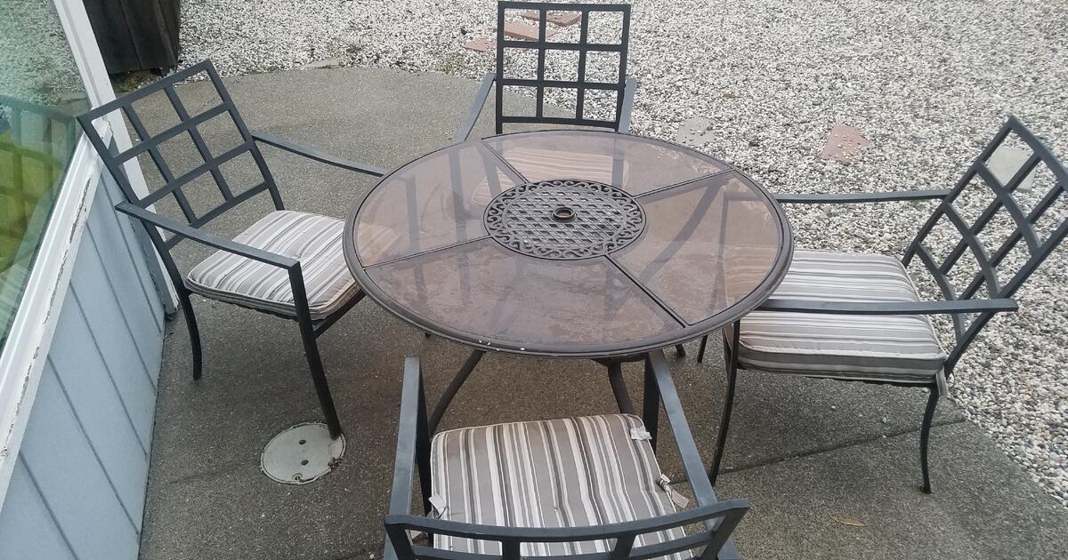 Glass patio table and 4 metal chairs for 100 in Napa, CA Finds