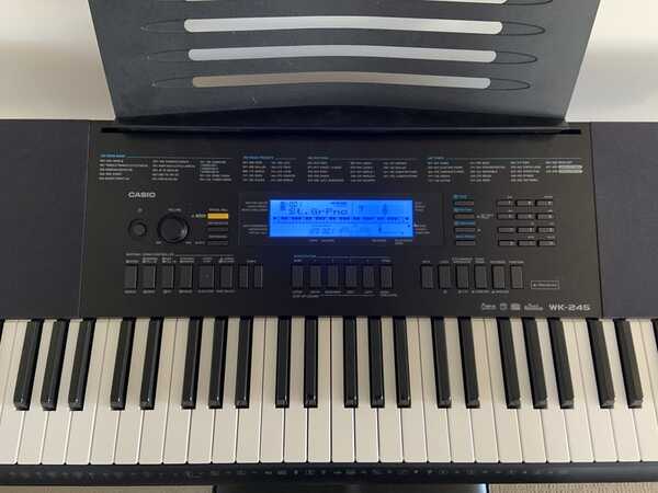 Casio WK-245 76-Key Keyboard, St&, Bench, Foot Pedal For $100 In
