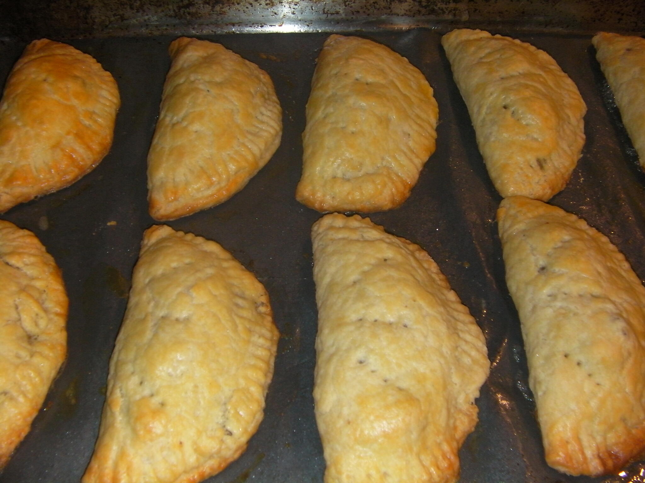 Baked meat empanada, canapes, cookies, dessert for charity events. We