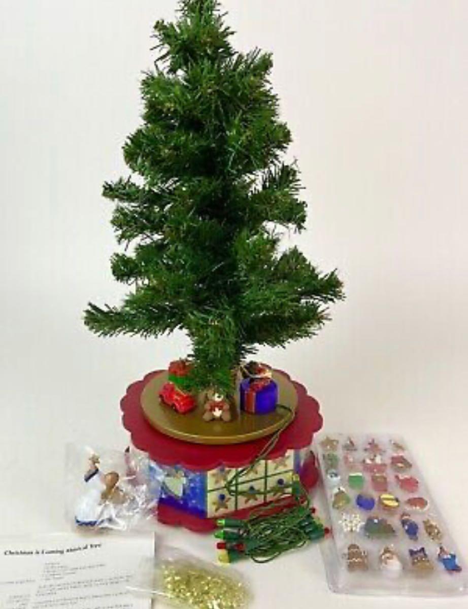 Vintage 1996 Avon Christmas is fashion Coming Musical Advent Christmas Tree