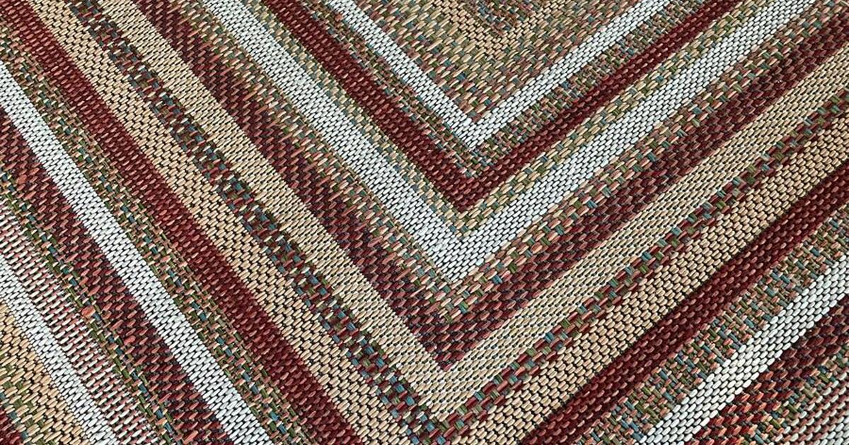 8x8 square outdoor rug. Used for 2 weeks I decided on something else