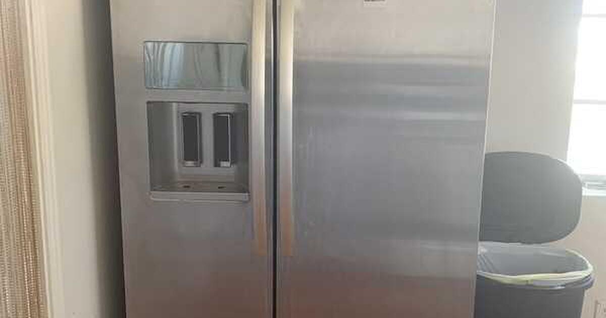 You can have this beautiful GE refrigerator. for 400 in Tucson, AZ