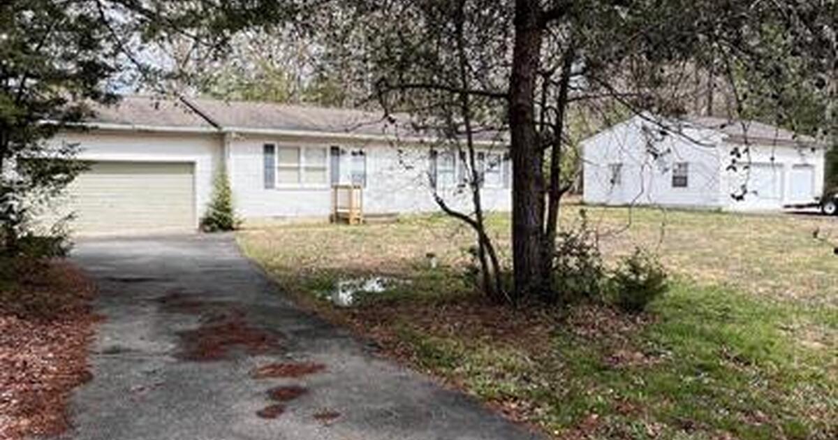 2 Bed 1 Bath home on almost 2 acres. Home has a 2 car attached garage