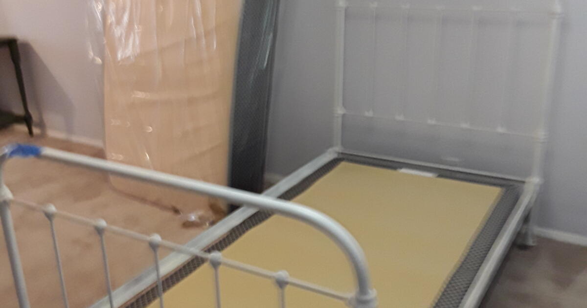Twin mattress and box springs; iron headboard and footboard for Free in