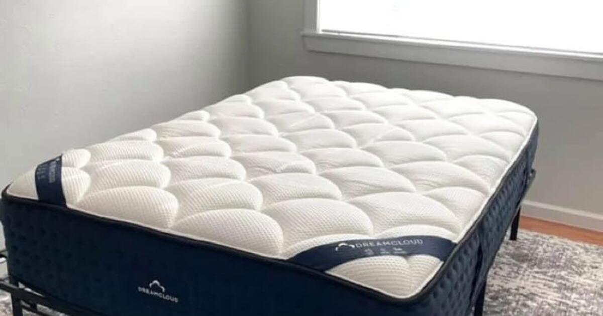 Delivery Available. Dreamcloud Twin XL Mattress. NEW, Never Used. for