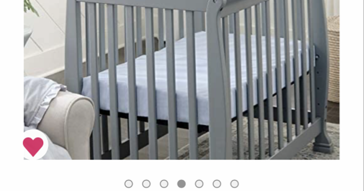 Gently used DaVinci Kalani 4in1 Convertible Mini Crib in Grey