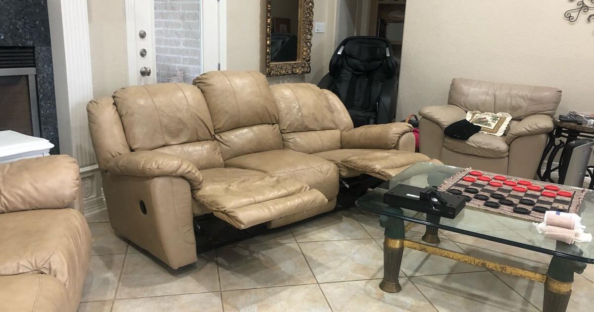 Leather Couch & Love Seat with 4 recliners attached for 350 in
