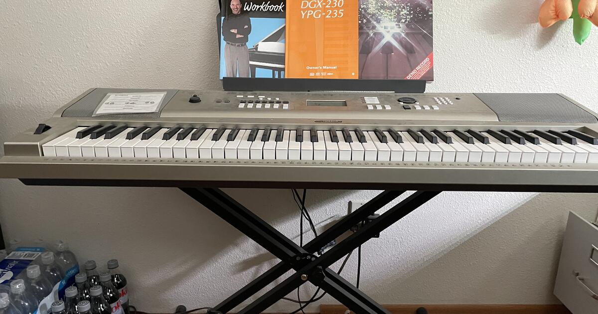 YAMAHA KEYBOARD PORTABLE GRAND DGX230 for 215 in Thousand Palms,