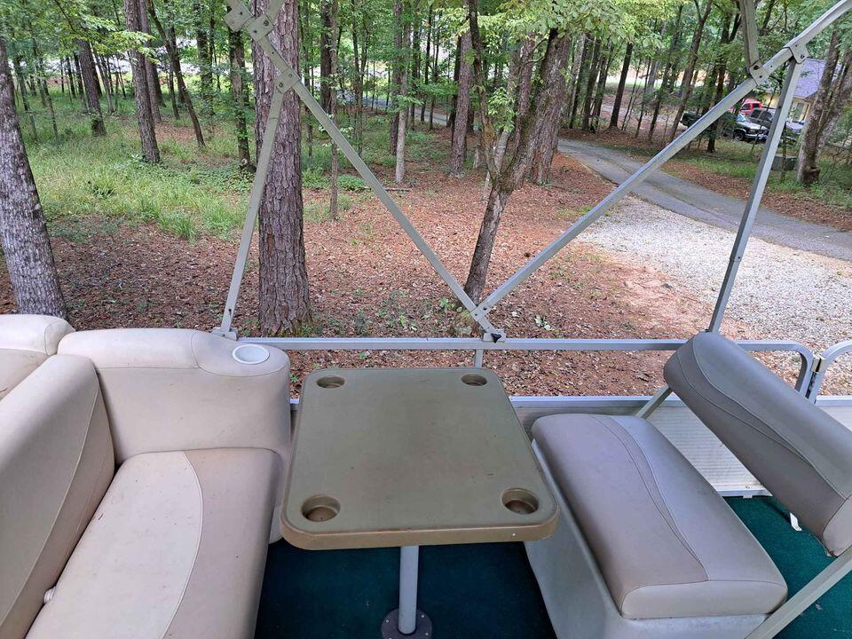 2002 Smokercraft Escape Pontoon Boat with bimini top for $8500 in