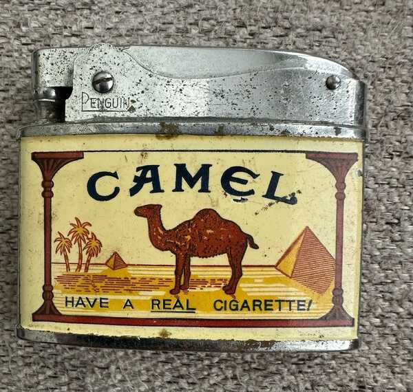 9 carat gold cigarette case A Cartier 9 carat gold and calibré-cut sapphires cigarette case, London 9 carat gold cigarette case A Cartier 9 carat gold and calibré-cut sapphires cigarette case, London