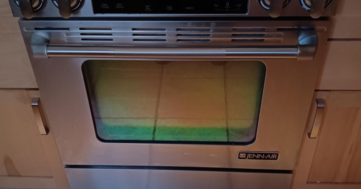 Jennair Dual Fuel Range with Convection Oven and Downdraft Ventilation