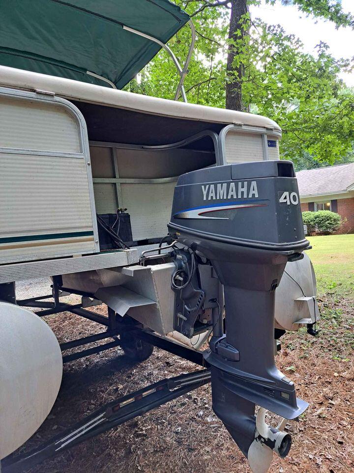 2002 Smokercraft Escape Pontoon Boat with bimini top for $8500 in