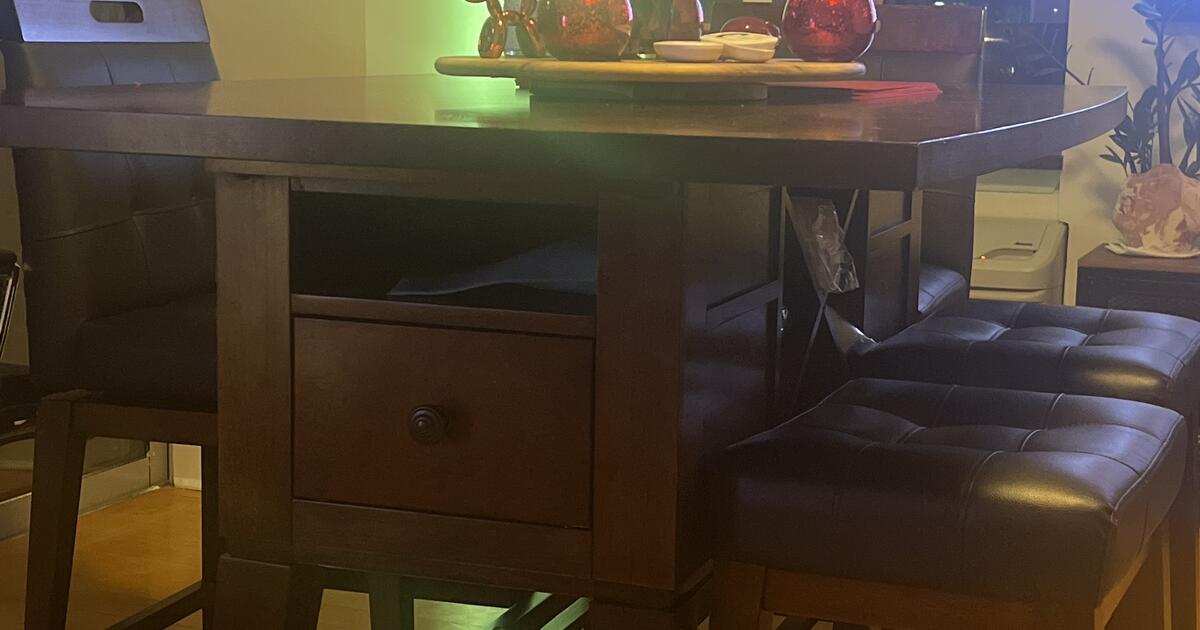 Pub Style Dining Table with two chairs and two benches for 700 in New