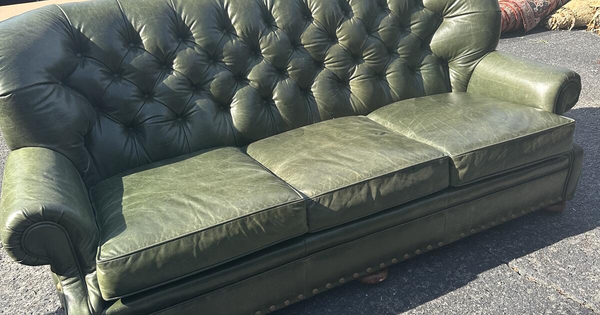 Hunter green leather sofa and Asian antique chest for 1000 in