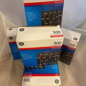 GE 300 icicle style lights white cord, white lights. $10 per box