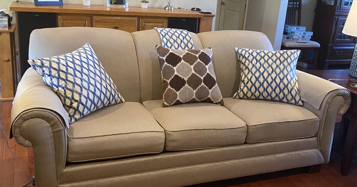 Broyhill sofa and loveseat and throw pillows with removable covers for