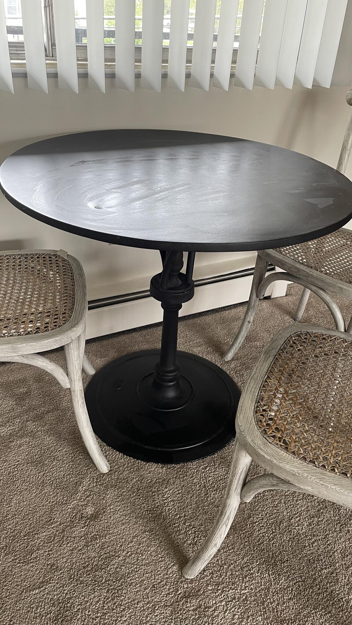 Restoration Hardware black metal cafe table and 3 wooden chairs for