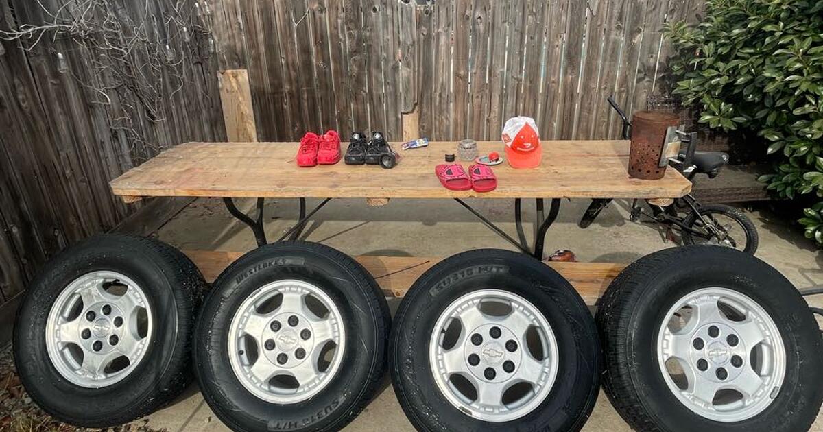 Stock rims and tires Chevy Silverado 1500 for 300 in Fresno, CA For