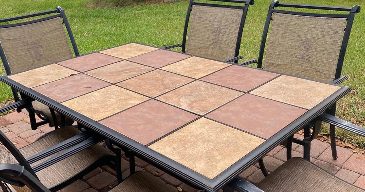 Table with slate top and 6 chairs for 75 in Kissimmee, FL For Sale