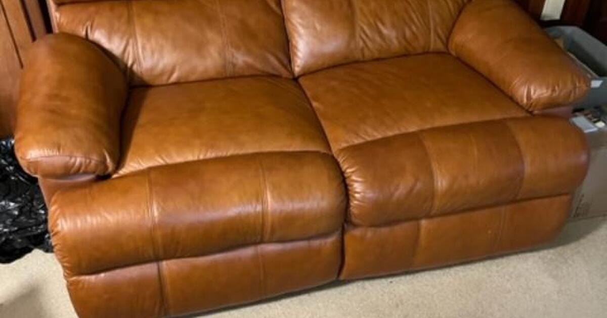 Leather love seat with dual recliners for 150 in Winston Salem, NC
