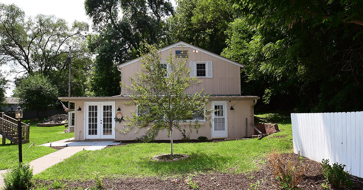 a boutique acreage in Crescent IOWA! 207 Old Mormon Bridge Road for