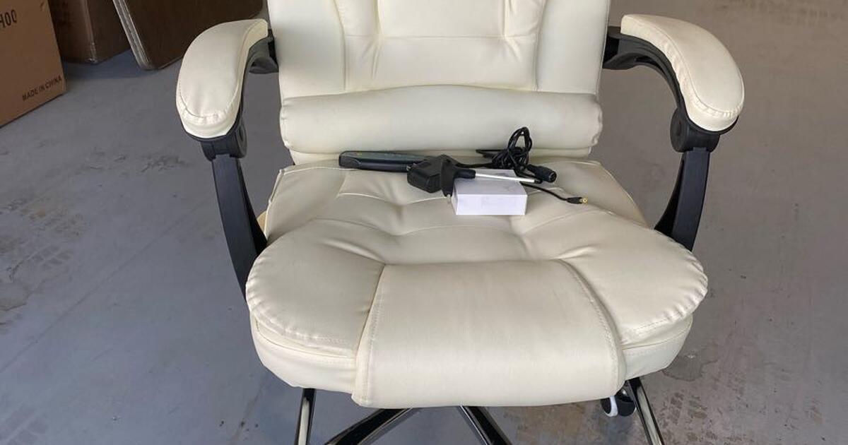 2 Brand New office chairs never used. Built in massager for 150 in