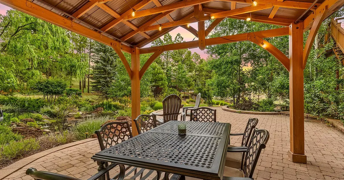 Metal patio dining table for 6 + cushions for 500 in Flagstaff, AZ