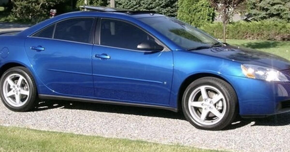 Pontiac G6 GTP 4 door sedan, low miles 106,535 heated leather seats