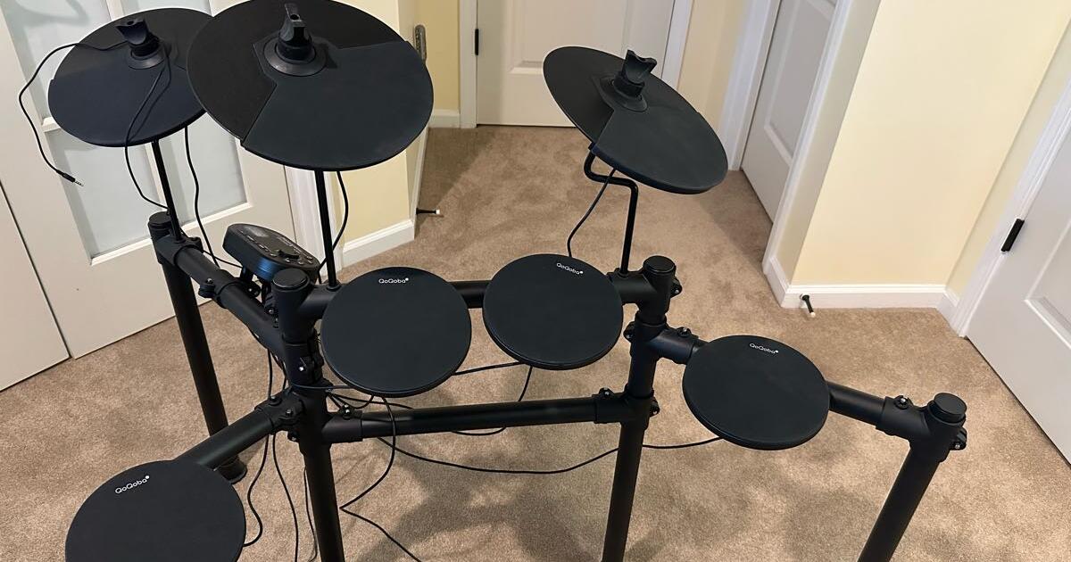 QoQoba Electronic Drum set with drum sticks and drum seat and QoQoba
