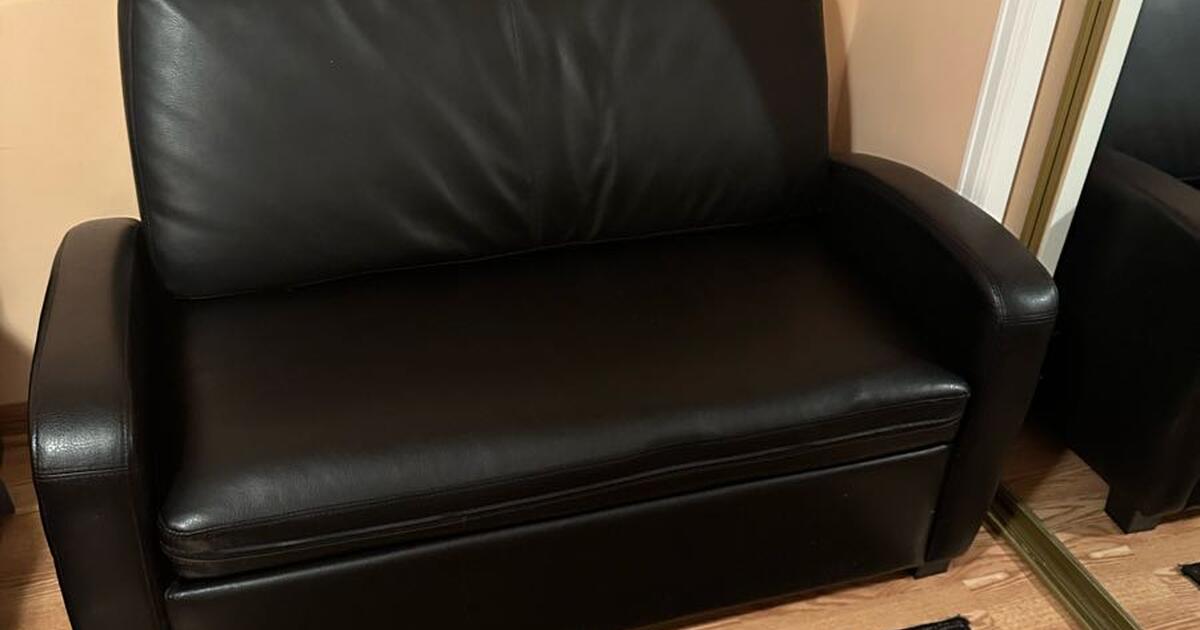 Love seat / converts to twin bed for sale. Like New! Asking 190 for