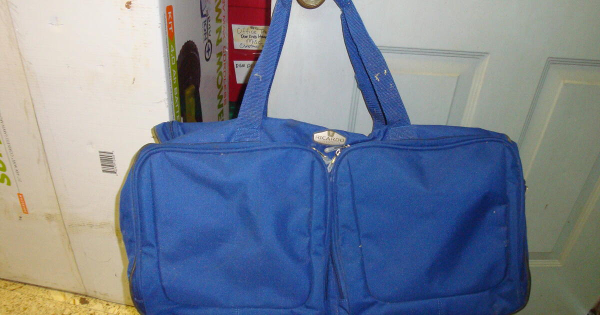 REDUCED!!!!!Ricardo Beverly Hills Blue Rolling Duffel Bag Luggage