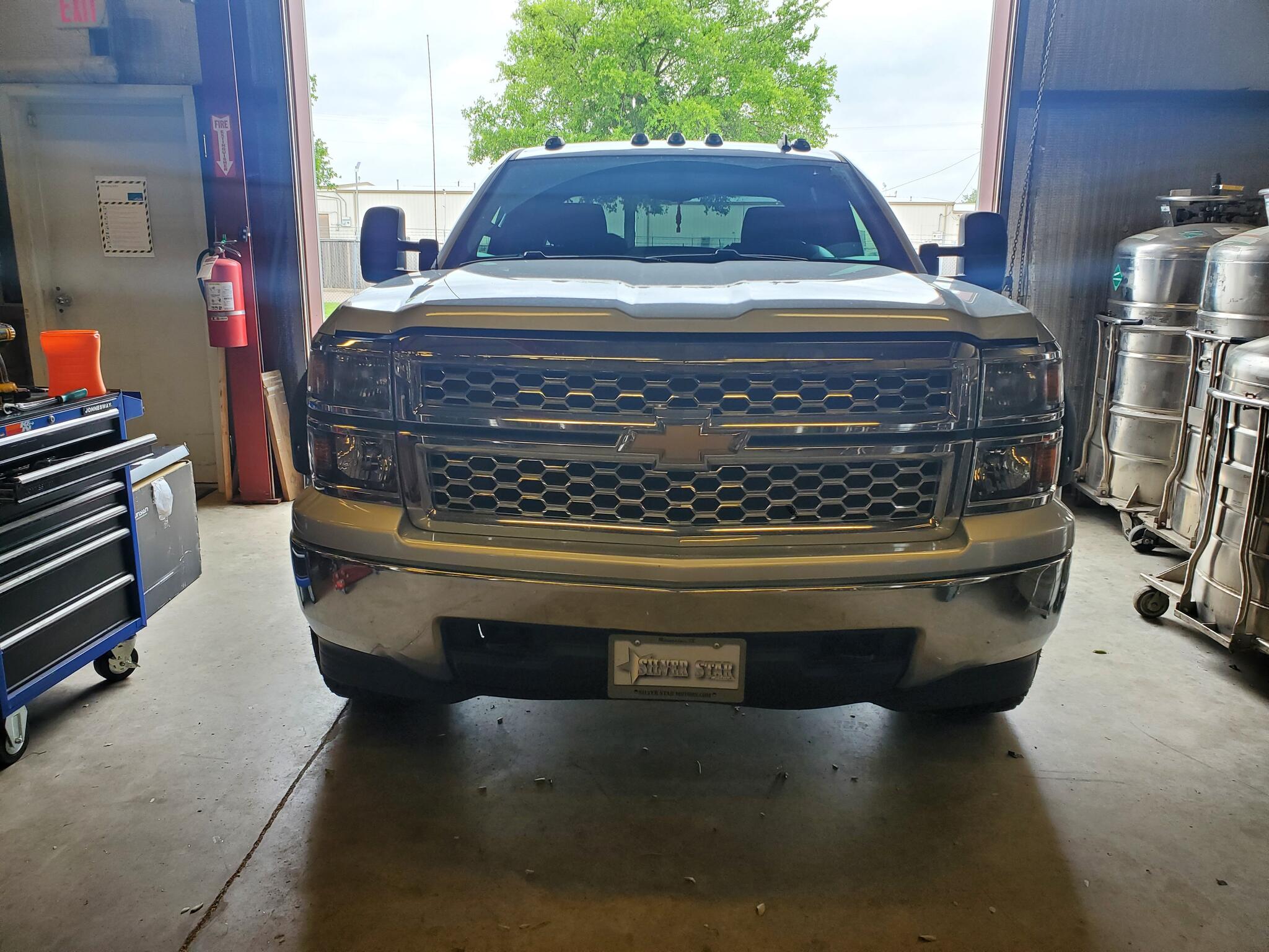 2014 Chevrolet Silverado OEM headlights for $500 in Waxahachie, TX