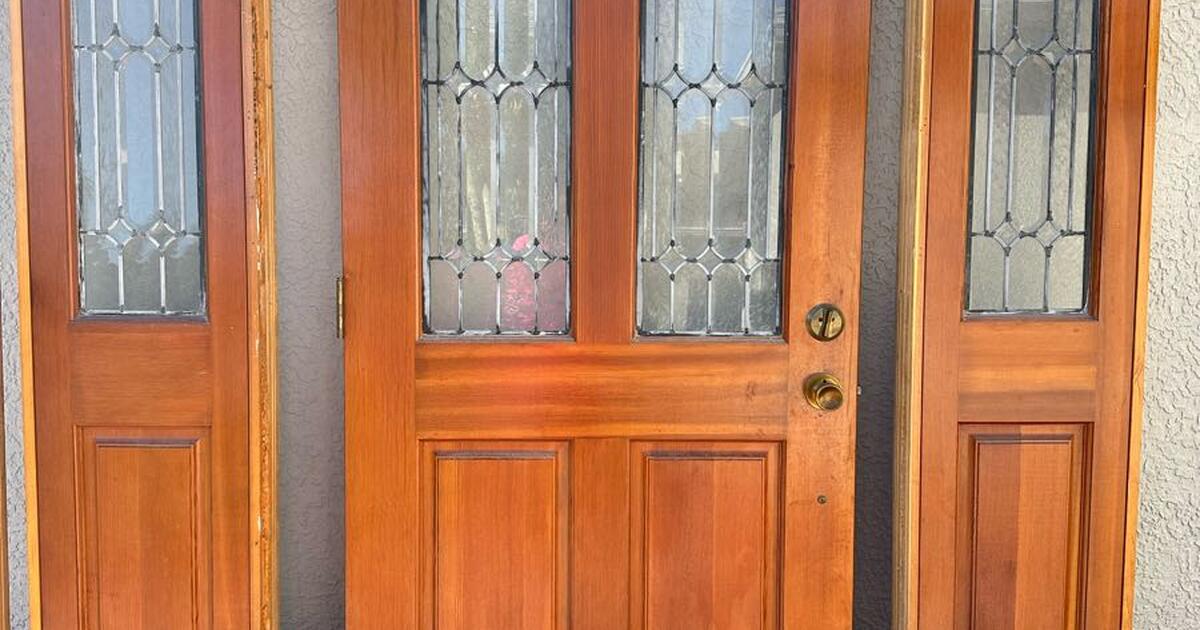 Solid wooden door with side panels for 105 in rockledge fl for sale