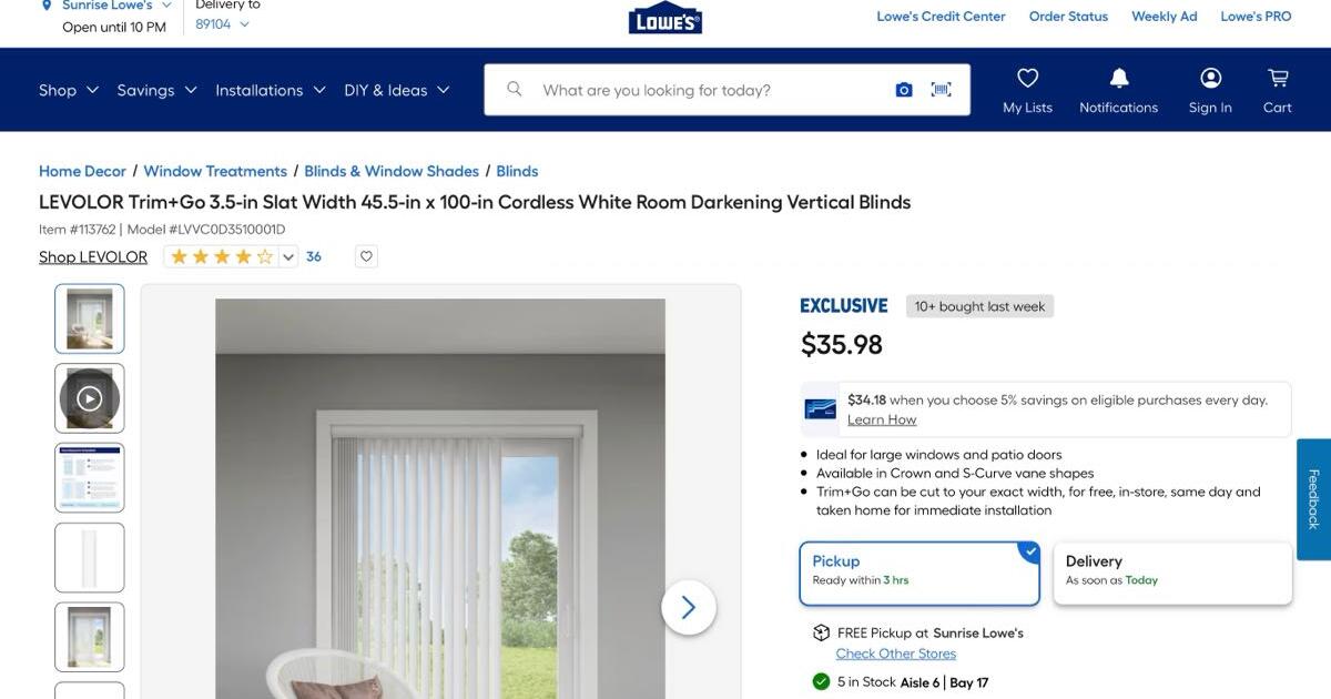 Levolor white vertical blinds 104 “ across and 84” blinds for 50 in