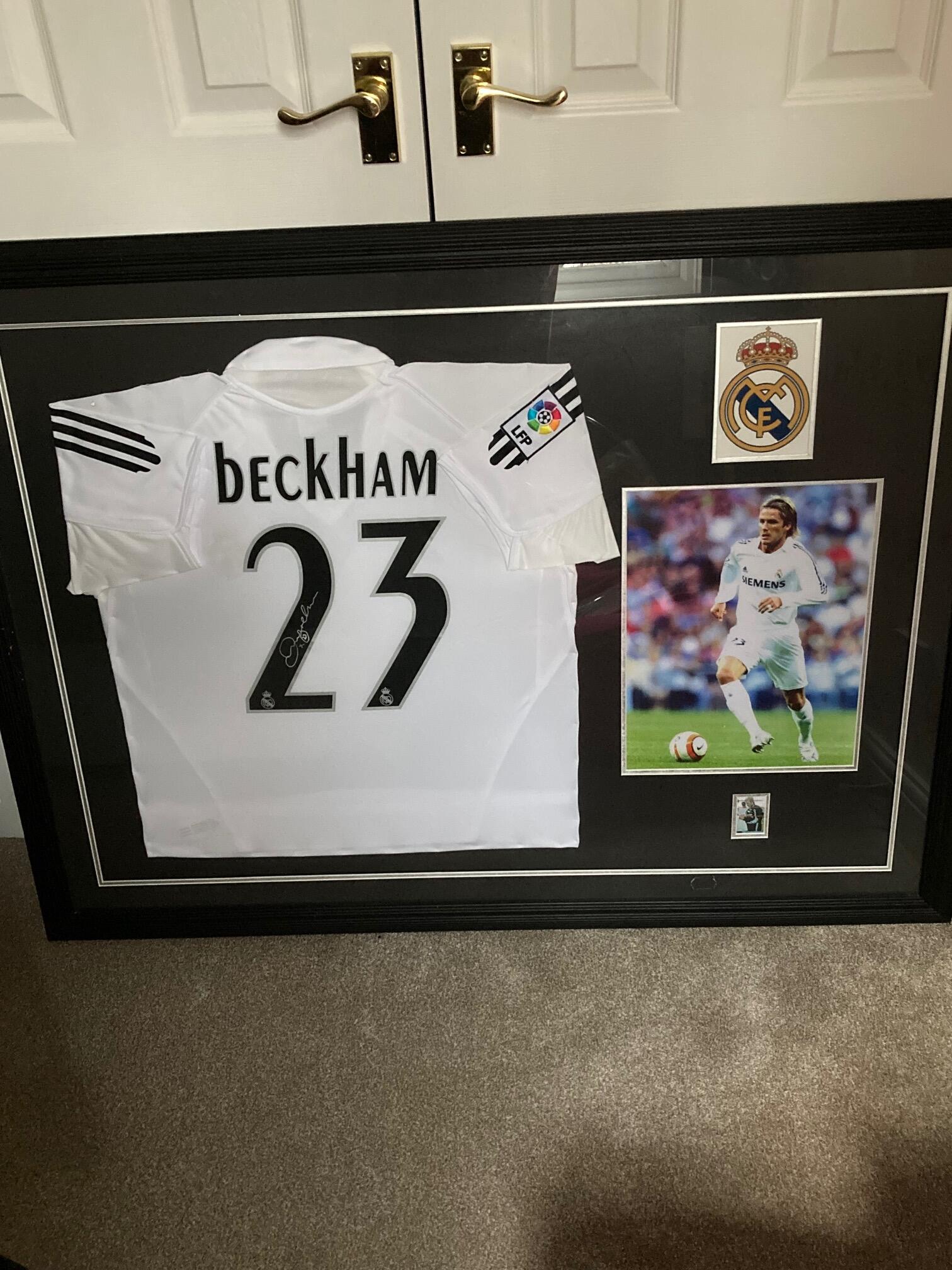 Lot 169 - DAVID BECKHAM SIGNED SHIRT IN FRAMED DISPLAY.