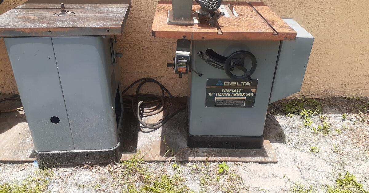 A heavy duty Table saw and a router saw from a shop for sale