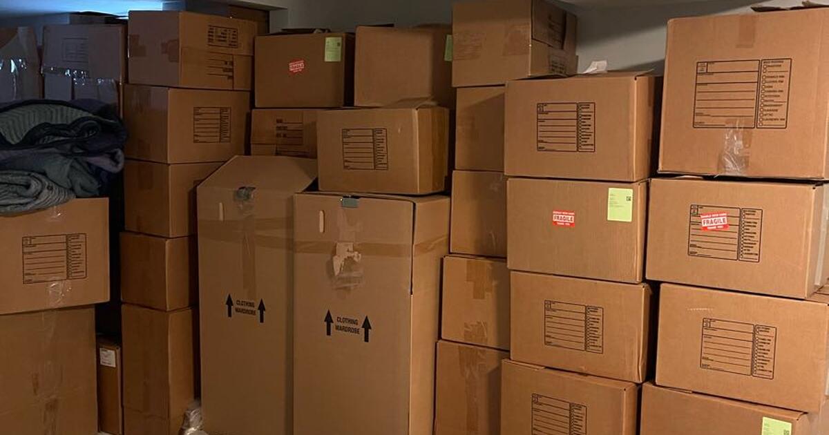 Cheap moving boxes with packing paper and moving blankets! for 2 in